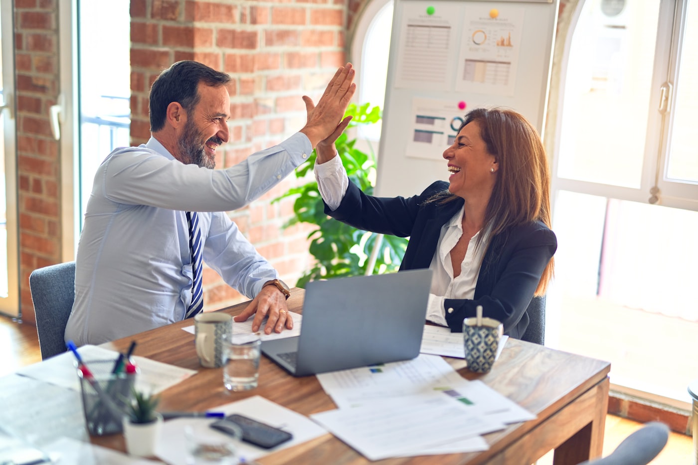 Accountant meeting with a small business owner to review financial records