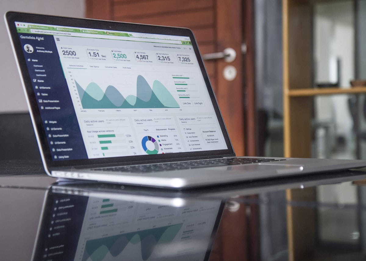Laptop showing accounting software dashboard with financial data